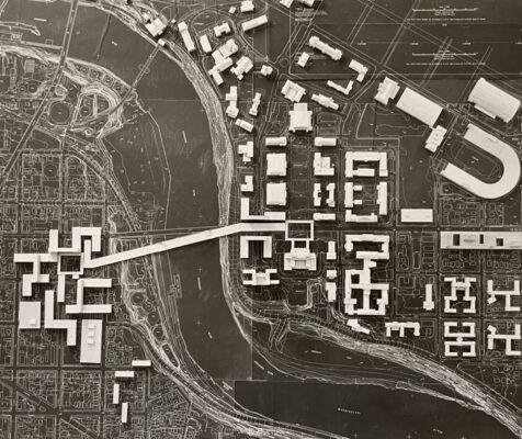 photo of a black and white aerial photo with white blocks set on top representing the new University of Minnesota campus